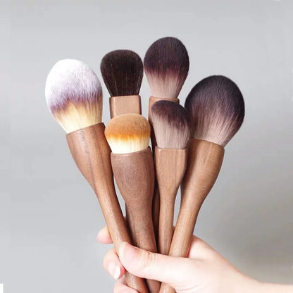Cruelty-free vegan makeup brush set, professional cosmetic tools with stylish walnut handles for expert application.