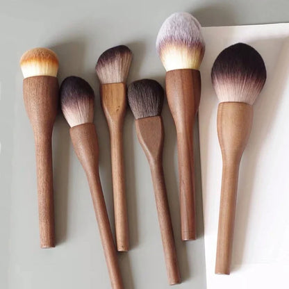 Soft synthetic bristles & ergonomic walnut handles in this professional vegan makeup brush collection.