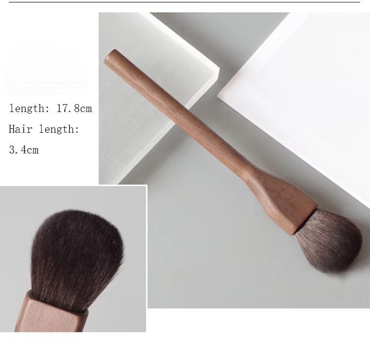 Diverse professional vegan makeup brush set, ergonomic walnut handles ensure precise cosmetic application.