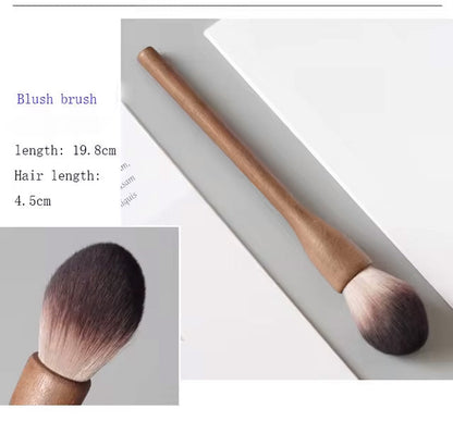Complete professional vegan makeup brush set, diverse cosmetic tools with elegant walnut handles.