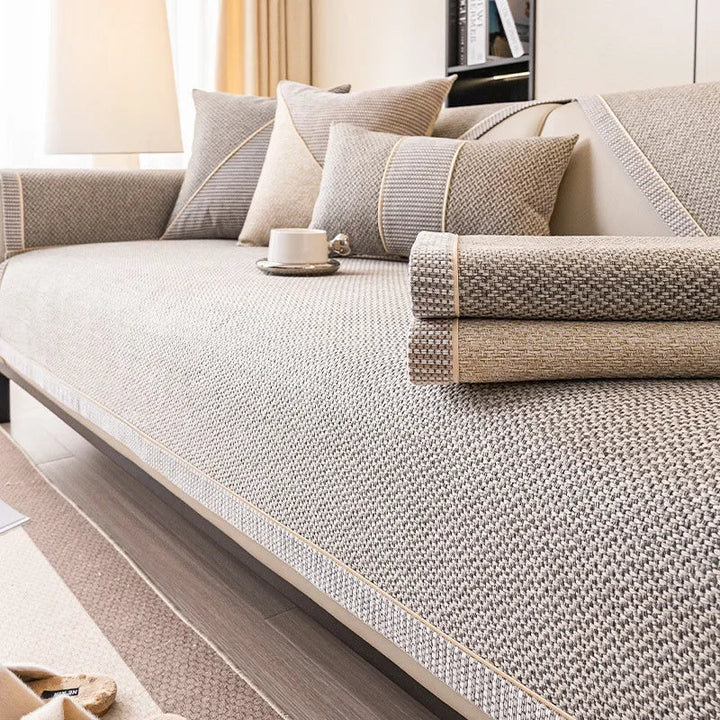 Stylish quilted cotton-linen couch throw. Enhances living room decor with a secure non-slip design.
