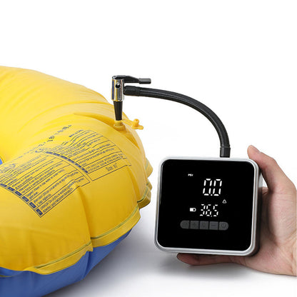 RapidFill portable tire inflator next to a mountain bike, illustrating its versatility for both car and bike owners.