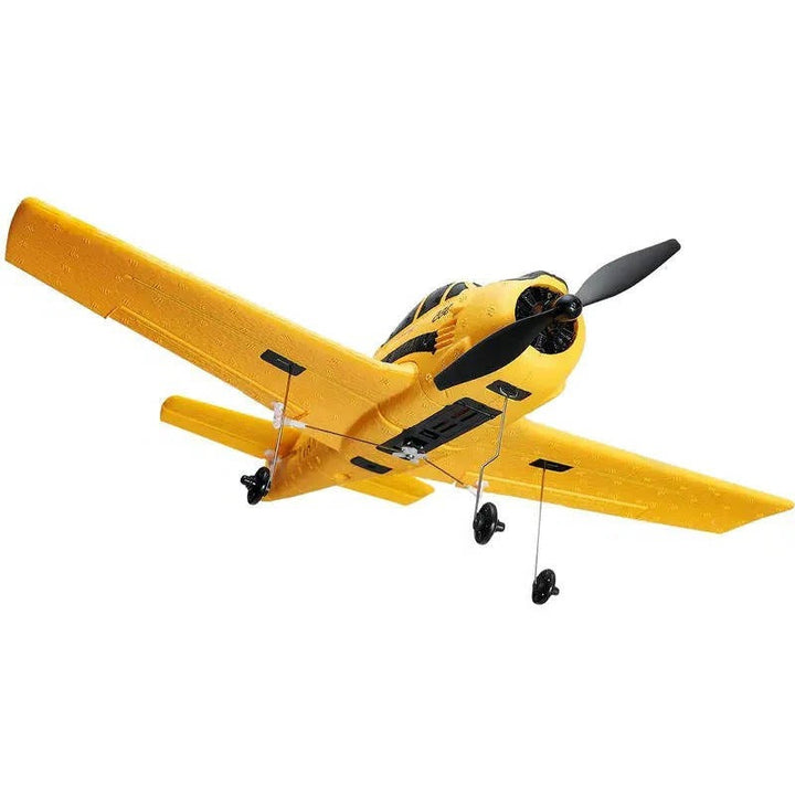 RC fixed wing airplane soaring outdoors. Features 6-axis gyro, dual batteries & durable EPP foam for fun flight.