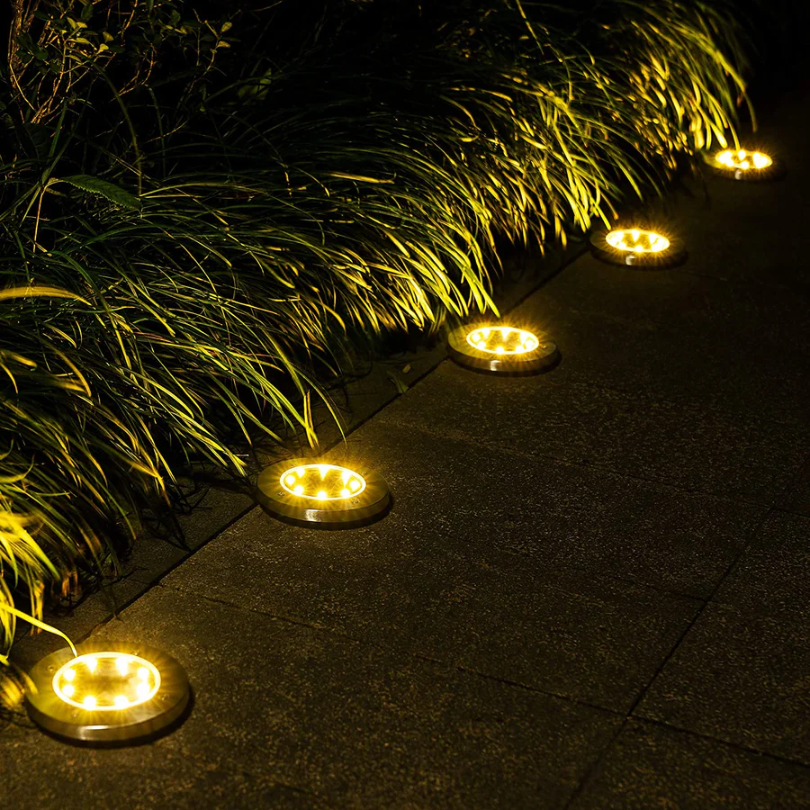 Modern rechargeable solar pathway lights for outdoor landscapes. Durable LED garden lights by EcoGlow, energy-saving.