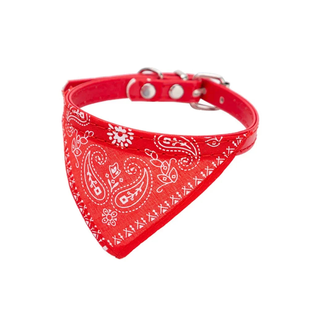 Red adjustable cat bandana collar with stylish print for small pets, comfortable pet fashion accessory.