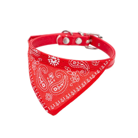 Red adjustable cat bandana collar with stylish print for small pets, comfortable pet fashion accessory.