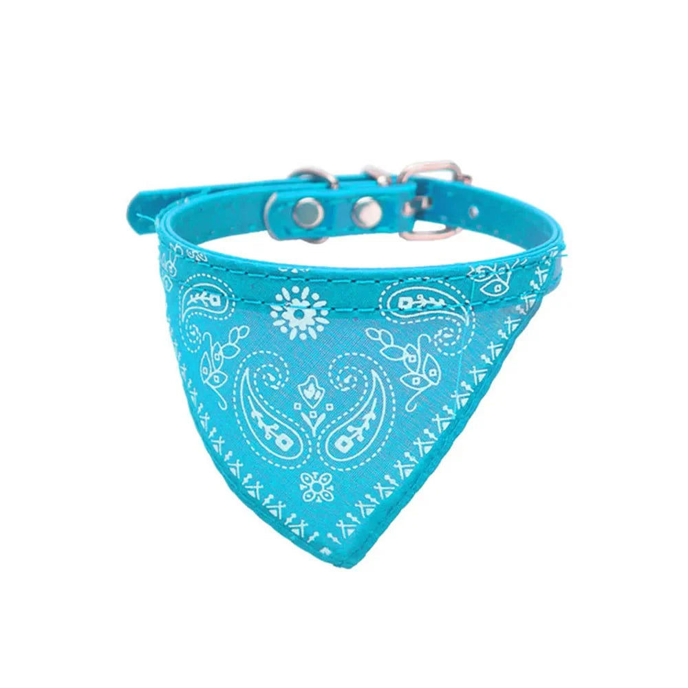 Comfortable adjustable cat bandana collar in a vibrant red print, perfect for stylish small pets.