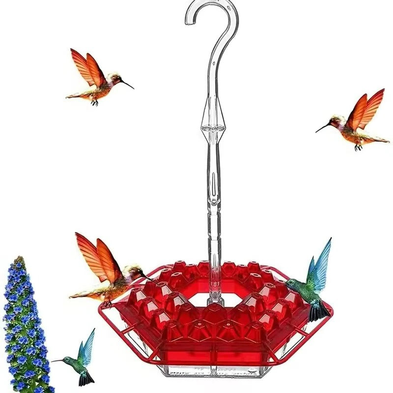 Red ant-proof hanging hummingbird feeder with perch, ideal for attracting tiny birds to your garden.
