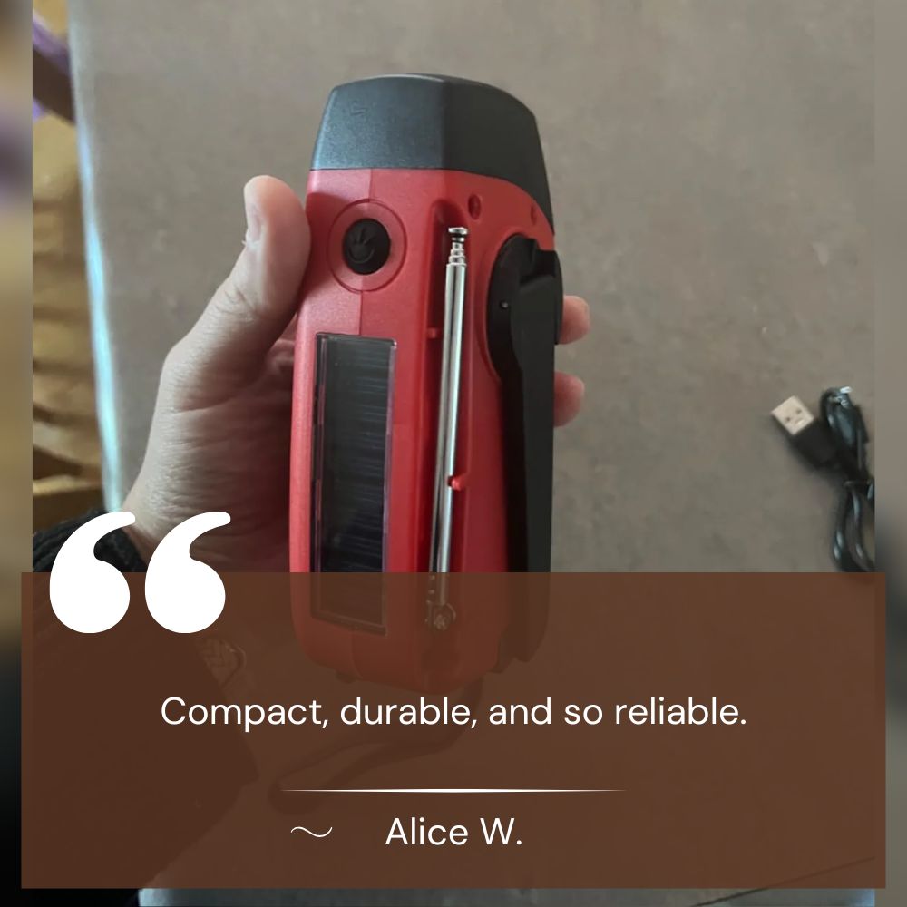 Compact survival gear: red hand crank solar radio with LED flashlight and mobile phone charger