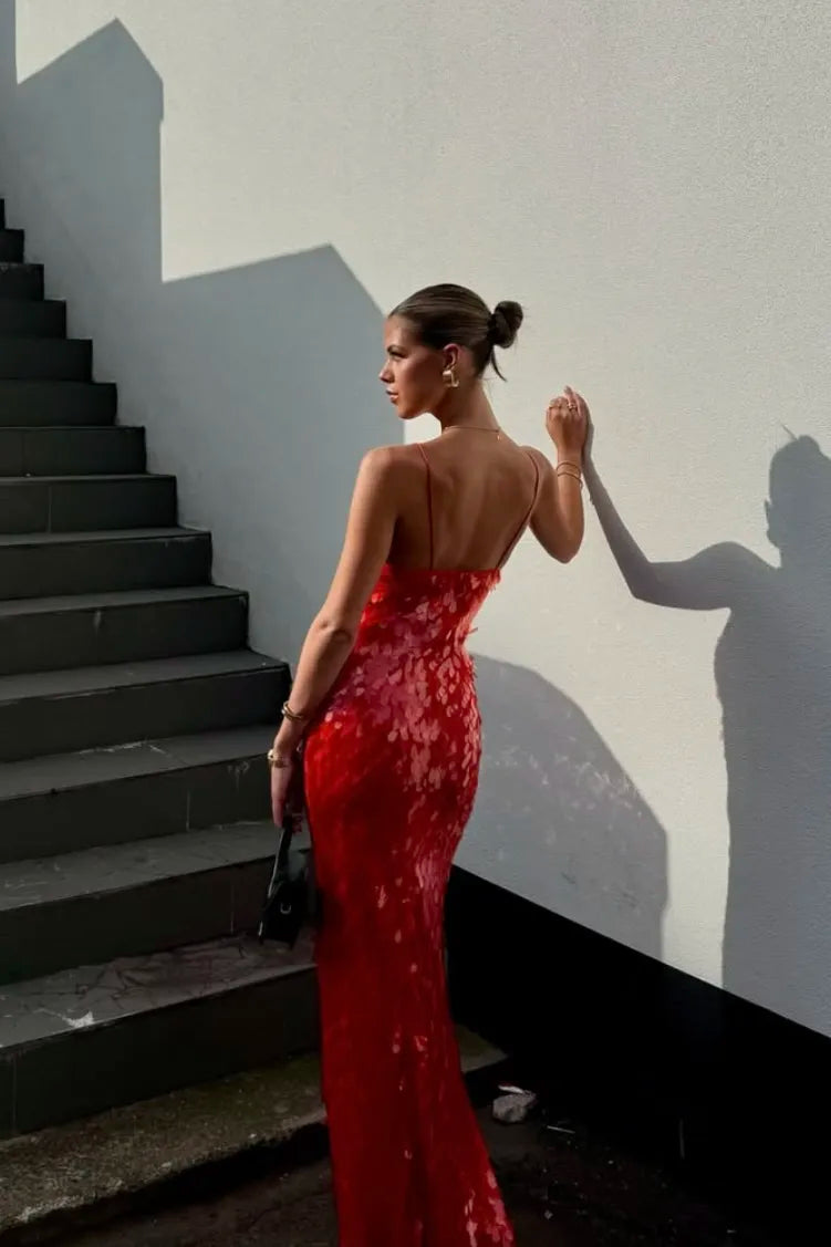 Elegant women's red sequin mermaid dress with V-neck & spaghetti straps for homecoming/prom.