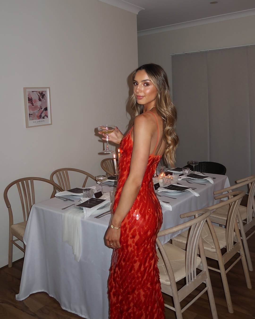 Women's V-neck red sequin dress with delicate spaghetti straps, an exquisite formal mermaid gown.