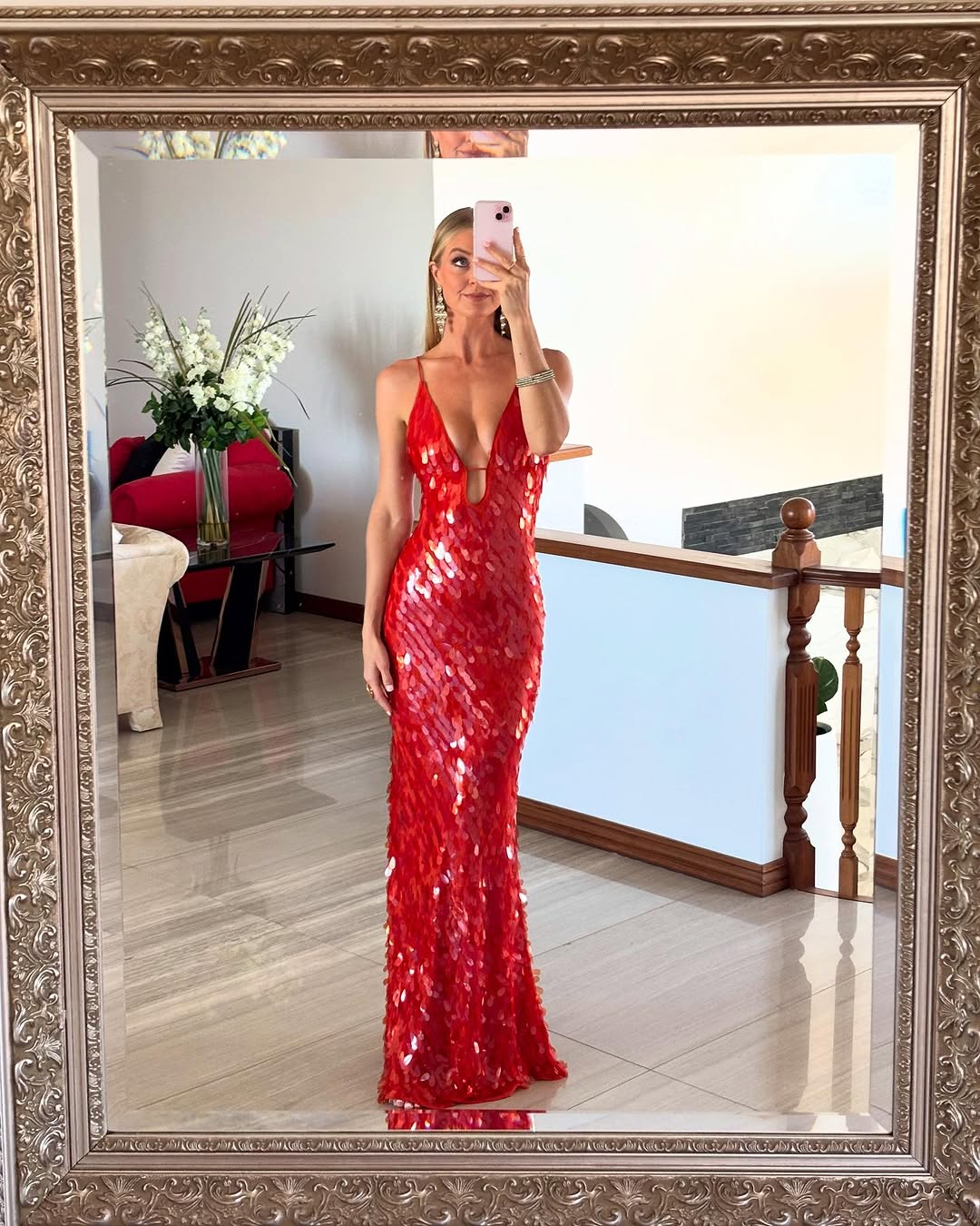 Vibrant red sequin formal dress with a sophisticated backless design, perfect for women's celebrations.