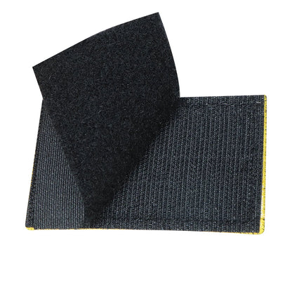 Close-up of a 'DO NOT PET' dog patch, hook and loop, high contrast for K9 communication