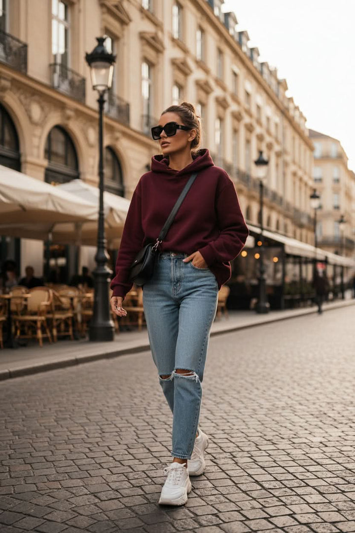 Pink hooded pullover sweatshirt, soft & breathable, ideal for athleisure layering.