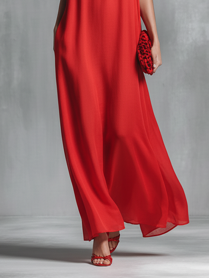 Chic red V-neck spaghetti strap maxi dress for women. Comfortable flowy design for vacation and cocktail events.