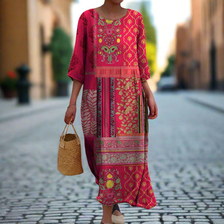 Flowing red women's bohemian maxi dress. Loose fit casual summer dress, ideal for beach fashion & vacations.