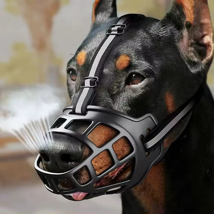 Reflective dog muzzle, breathable & water-friendly, for pet safety during walks. Adjustable anti-bite design.