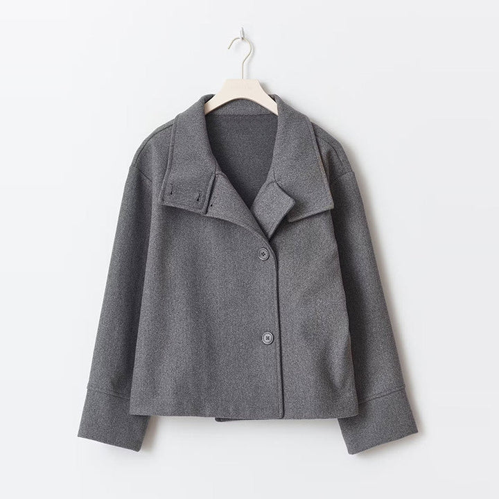 Women's short coat featuring a high neck, full button closure, and a comfortable relaxed fit for everyday style.