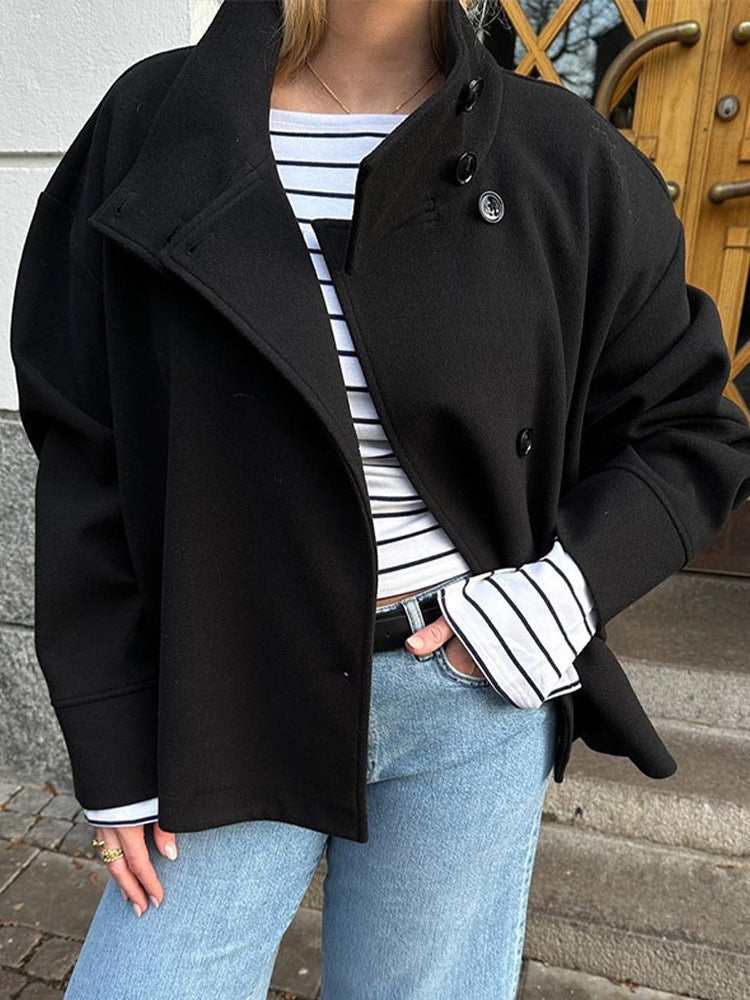 Versatile women's relaxed fit short coat with high neck and button closure, enhancing modern casual fall fashion.
