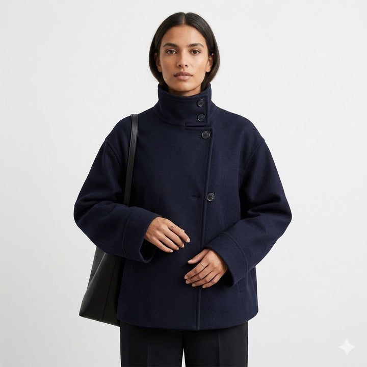 Comfortable & stylish women's short coat; relaxed fit, high neck, button closure. Great for casual fall/winter wear.