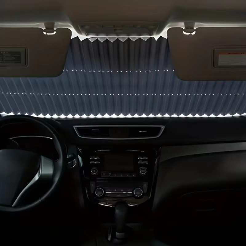 UV reflective retractable car sunshade set, protecting vehicle interior from sun heat damage & glare.
