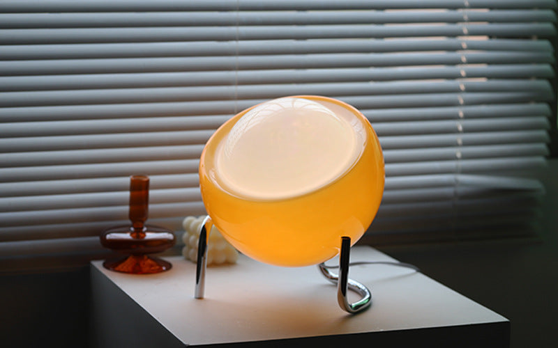 Decorative glass table lamp with a retro touch, offering Nordic-inspired home lighting.