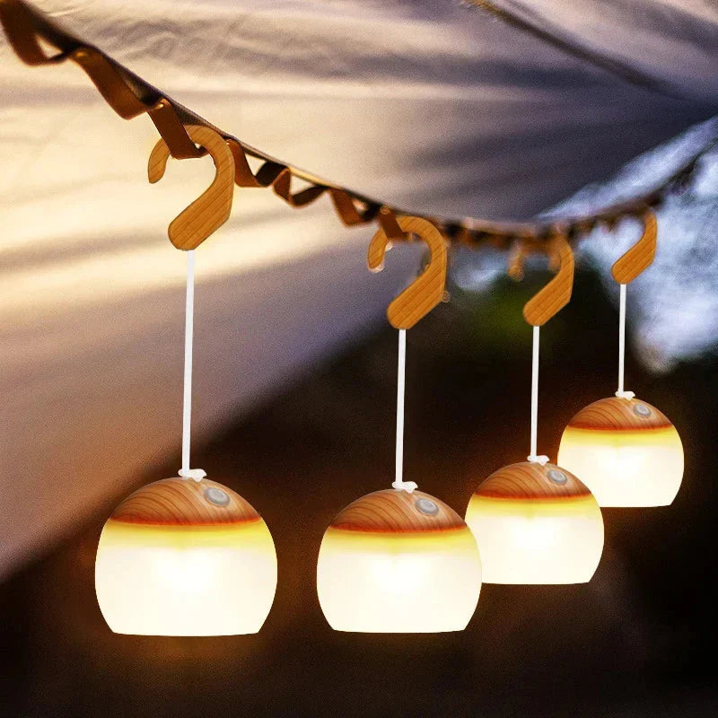 Retro LED camping lantern with USB rechargeable battery, ideal for outdoor adventures & vintage camp vibes.