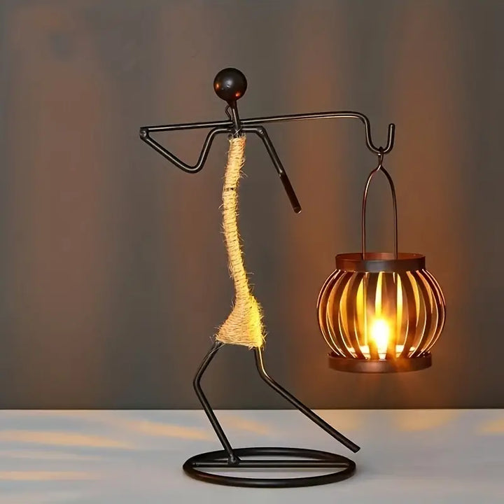 Close-up of a retro metal candle holder, showcasing its stylish design and vintage finish.