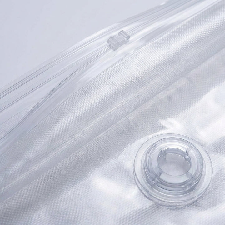 Closet organizer: large reusable vacuum storage bags for bedding & seasonal clothing, maximizing home space.