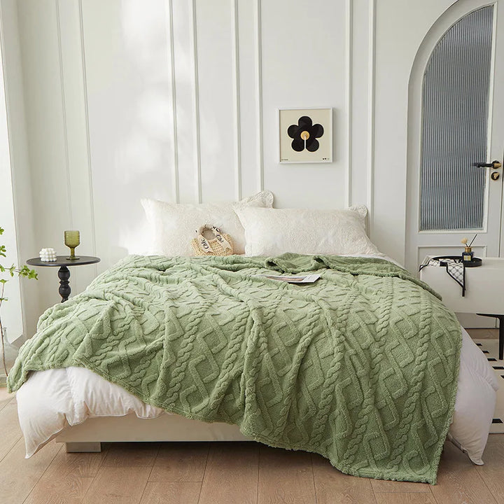 Plush reversible lambswool blanket, a thick and luxury soft throw for cozy home decor and winter comfort.