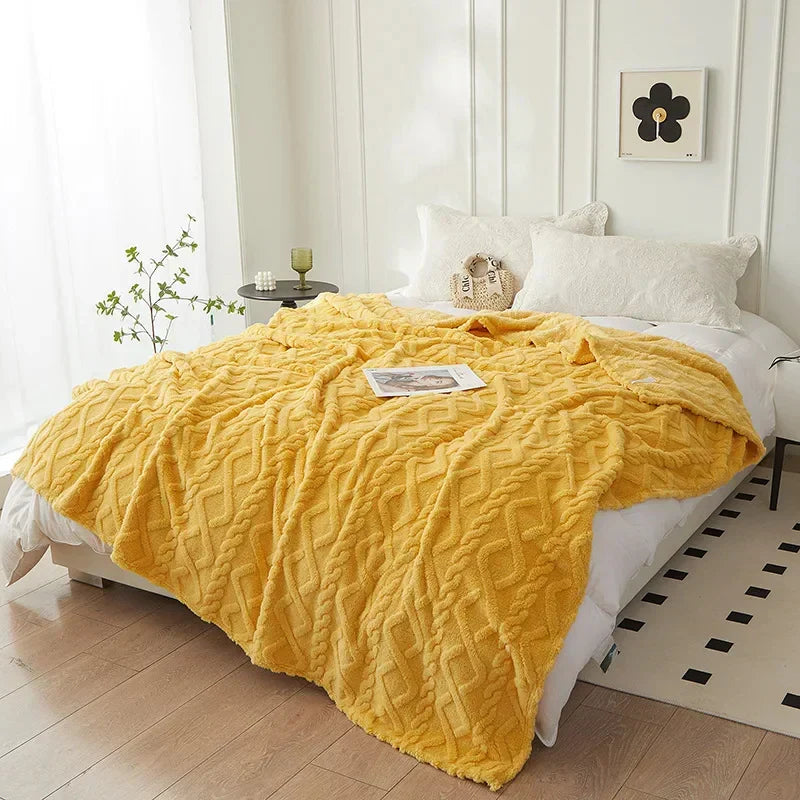 Insulating reversible lambswool blanket, thick and plush for warm winter comfort. A luxury soft bed throw.