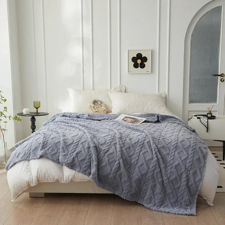 Stylish reversible lambswool blanket, a thick cozy throw for elegant home decor and ultimate warmth.