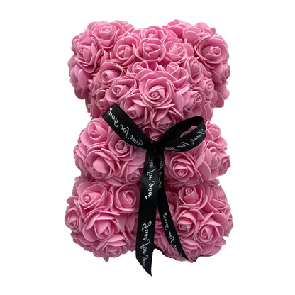 Vibrant red rose teddy bear, a romantic and lasting flower bear gift for women.