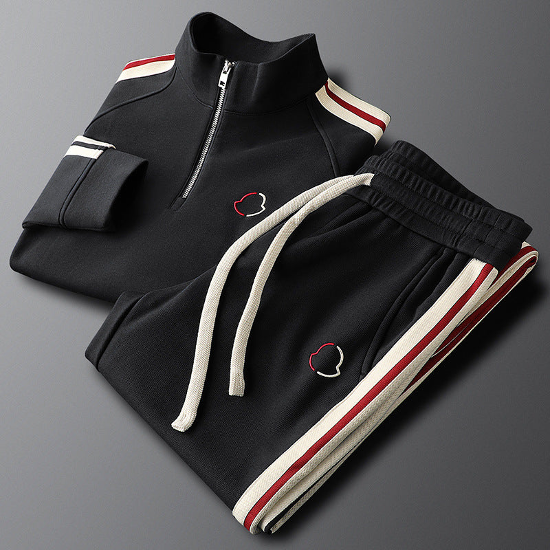 Deep black men's performance tracksuit, versatile jogger set for gym, running, or daily wear.