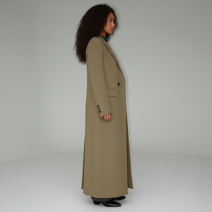 Fitted ruby women's long tailored coat, enhancing a sleek silhouette. Structured evening wear.