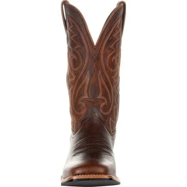 Stylish black men's slip-on cowboy boots, western mid-calf design with a classic square toe for durability.