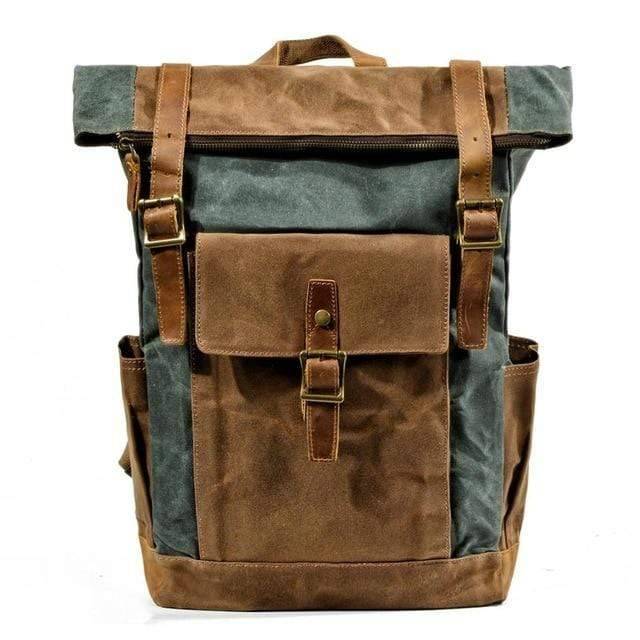 Men's vintage outdoor backpack with metal buckles and leather accents.
