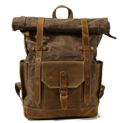 Stylish vintage canvas and leather backpack for urban exploration.