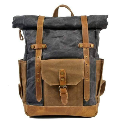 High-angle view of a men's travel canvas leather backpack.