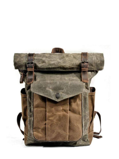 Side profile of men's travel backpack, strong canvas and leather.