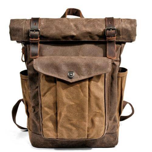 Detailed shot of leather straps on a rugged daily backpack.