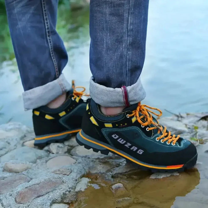 Rugged waterproof men's hiking boots for trail adventures, durable outdoor gear.