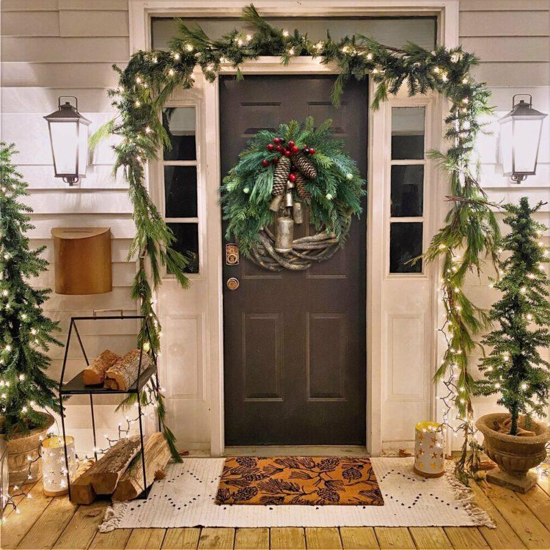 Boho Christmas wreath, rustic holiday decor. Festive farmhouse design for winter door or wall hanging.