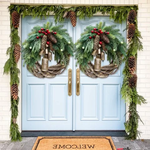 Rustic boho Christmas wreath, unique farmhouse holiday decor. Ideal for a warm, festive winter home welcome.