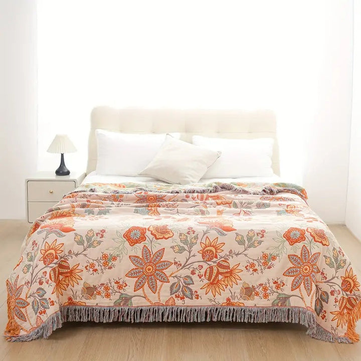 Decorative cotton throw with an intricate rustic floral and bohemian design for any room.