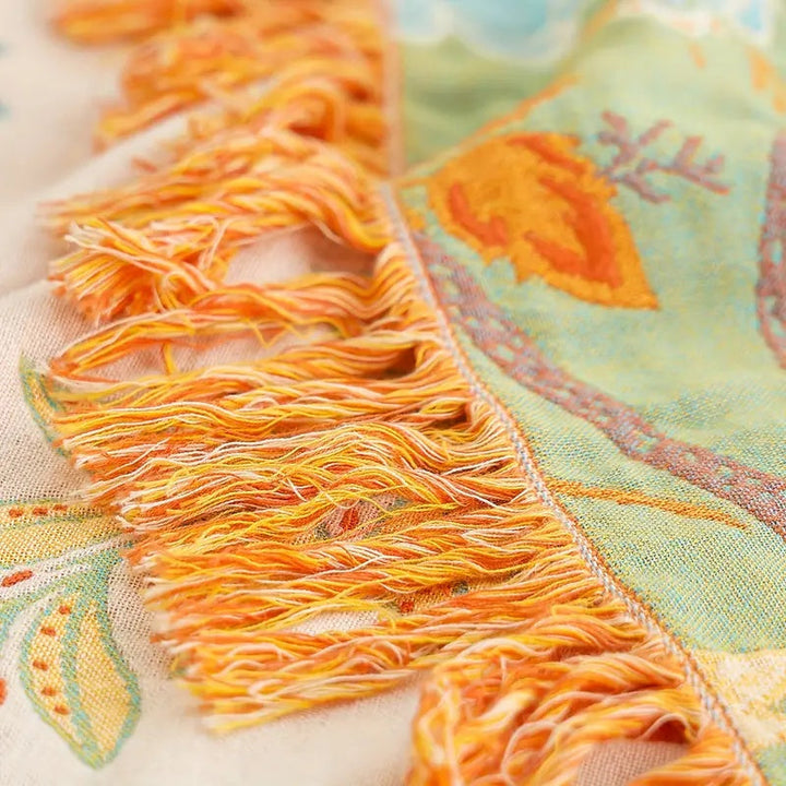 Luxurious cotton boho blanket, a rustic floral throw offering warmth and style to your home.