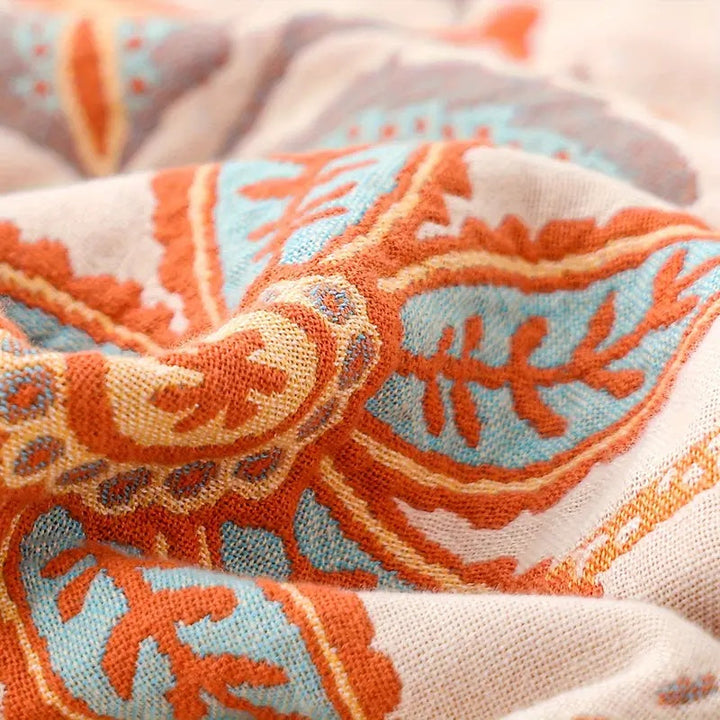 Chic rustic floral cotton blanket, a versatile boho throw perfect for beds or sofas.
