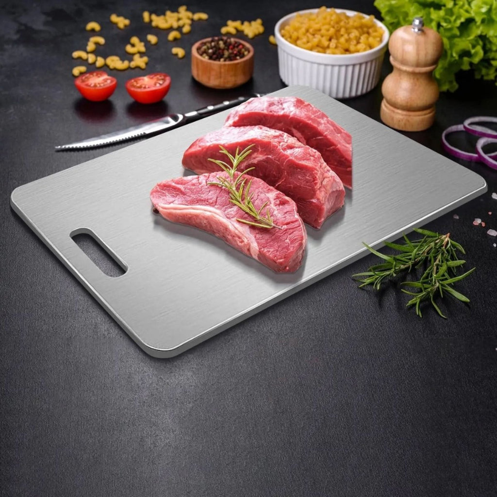 Durable stainless steel cutting board with non-slip base for safe and hygienic meal prep & cooking.