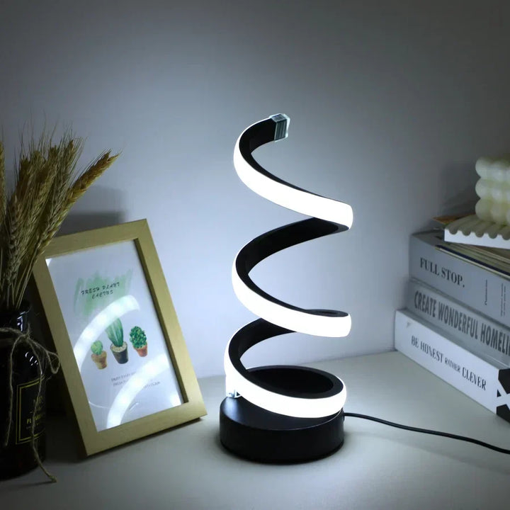 S-shaped LED desk lamp, FlexiGlow, enhancing modern office lighting & workspace decor. USB powered, eye-friendly.