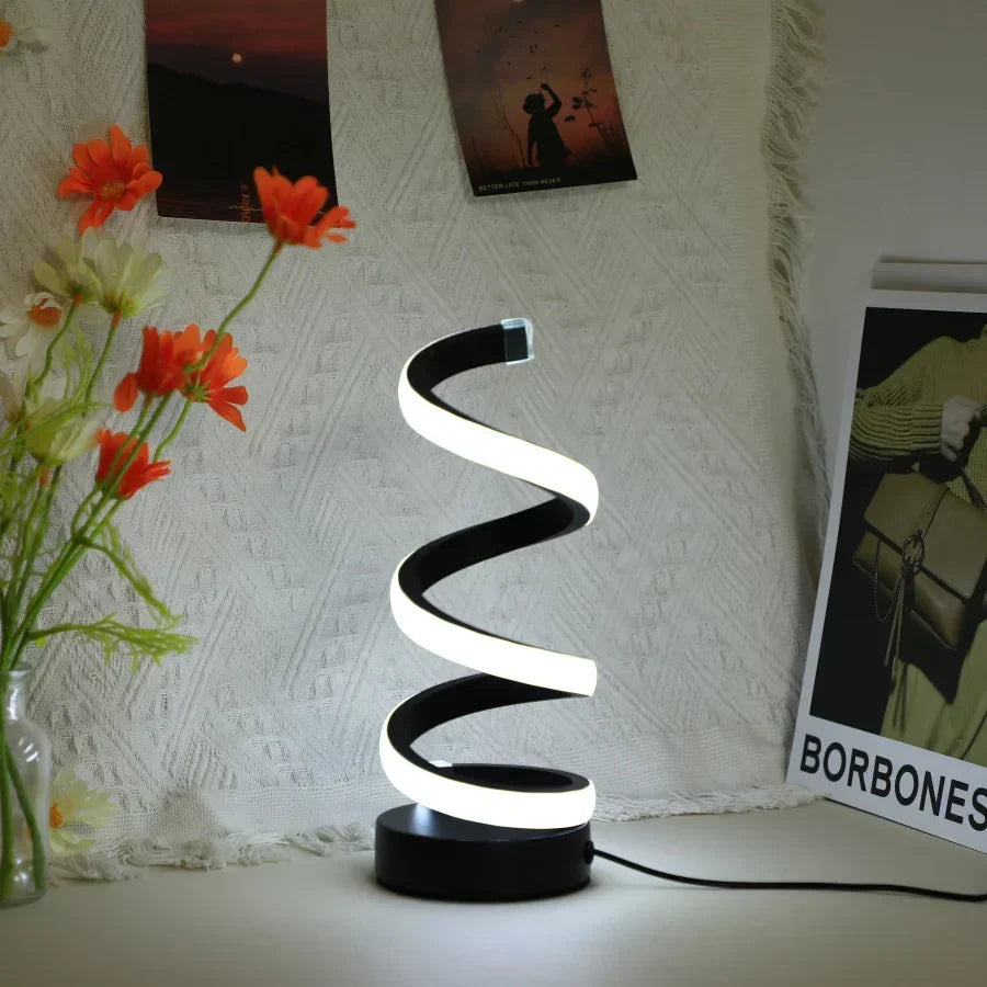 Modern S-shaped LED desk lamp by FlexiGlow for a stylish home office. Provides eye protection & bright, efficient lighting.